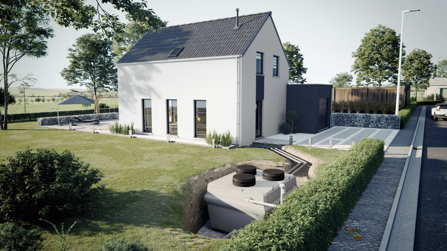 un filtre compact x-perco® enterrée dans le jardin d'une maison